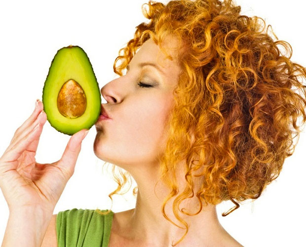 woman kissing avocodos