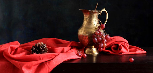 copper pot and grapes