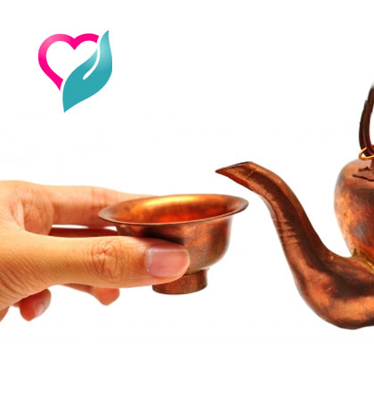 drinking water in copper pot