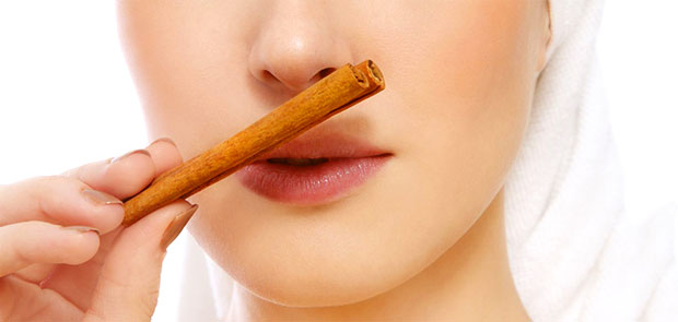 woman smelling cinnamon