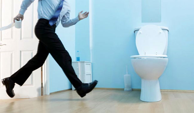 man running to urinate